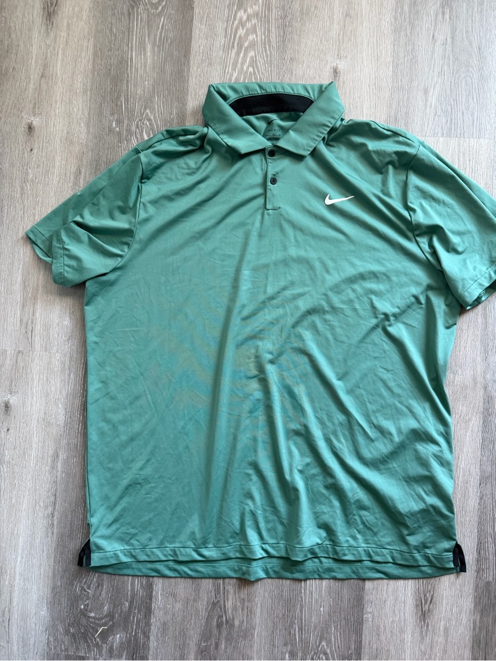 Nike Men’s Teal Green Polo with White Swoosh